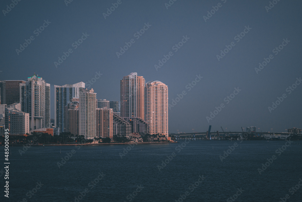 city skyline at night urban MIAMI buildings sea bridge