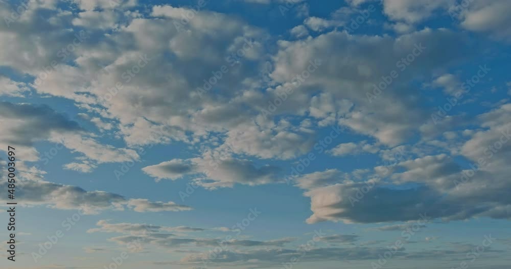 Slowly moving white cloud in horizon summer bright blue wispy sky at sunny day morning sunlight beautiful relaxing cloudscape timelapse Slowly moving white cloud in horizon summer bright blue wispy sky at sunny day morning sunlight beautiful relaxing cloudscape timelapse