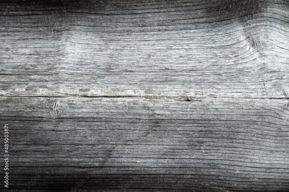 grunge background: sunburnt whitened wood surface close, cracks and dents, toning grunge background: sunburnt whitened wood surface close, cracks and dents, toning