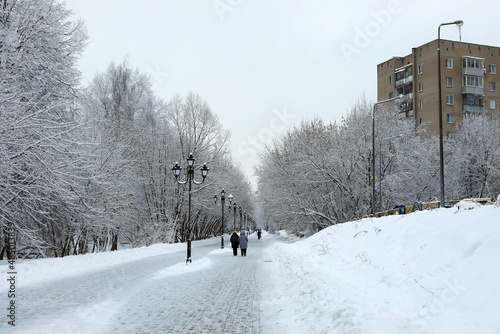 Walking area along the Pekhorka River. Citiy park in winter. City of Balashikha, Moscow oblast, Russia. photo