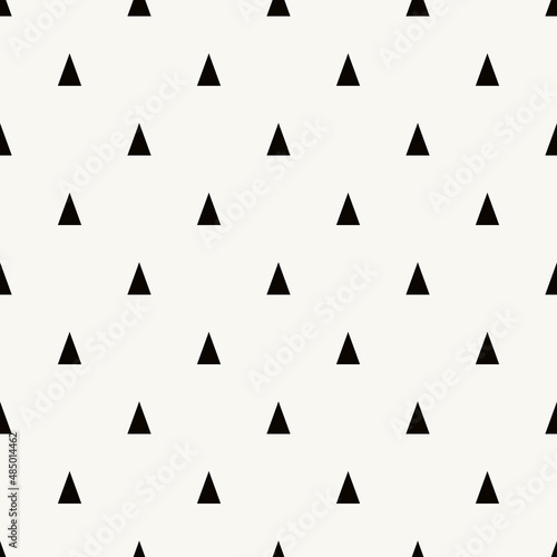 Seamless pattern with triangles. Abstract geometric pattern with black and white triangles. Pastel background with cute confetti.