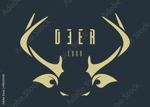Deer logo concept design. Golden stylized deer head on a dark green background. Deer lettering. Vector illustration