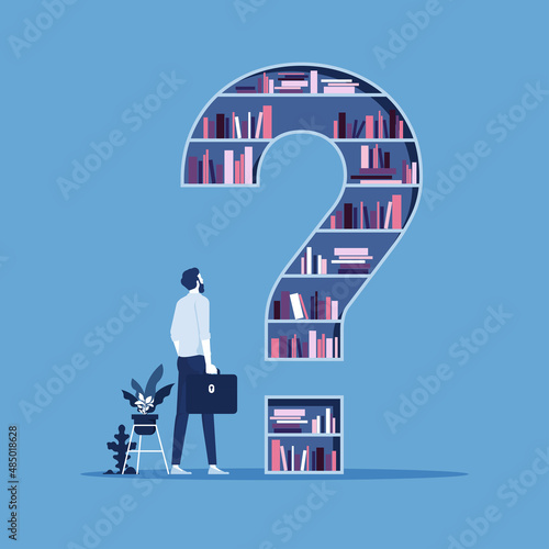 Businessman stands in front of a large closet with books in the form of a question mark, and think what choice to make