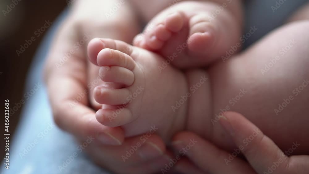 Baby Feet On Mother Hands. Cute Tiny Newborn Kid's Legs On Female Embrace Closeup. Mom And Her Child. Happy Family Concept. Beautiful Conceptual Video Of Maternity. Adorable Tiny Toes Selective Focus Baby Feet On Mother Hands. Cute Tiny Newborn Kid's Legs On Female Embrace Closeup. Mom And Her Child. Happy Family Concept. Beautiful Conceptual Video Of Maternity. Adorable Tiny Toes Selective Focus
