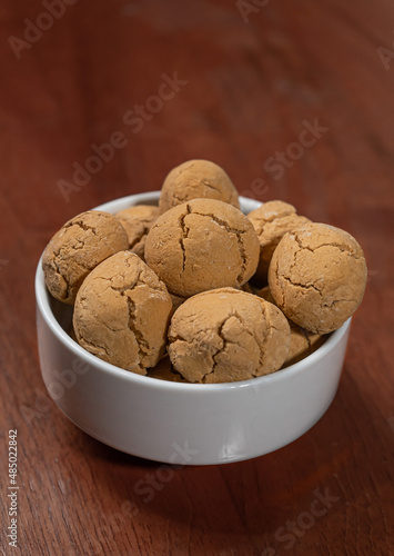 Plate of rosquitas, regional cookies with flour and sugar cane syrup, made in Peru (Bolimiel)  photo