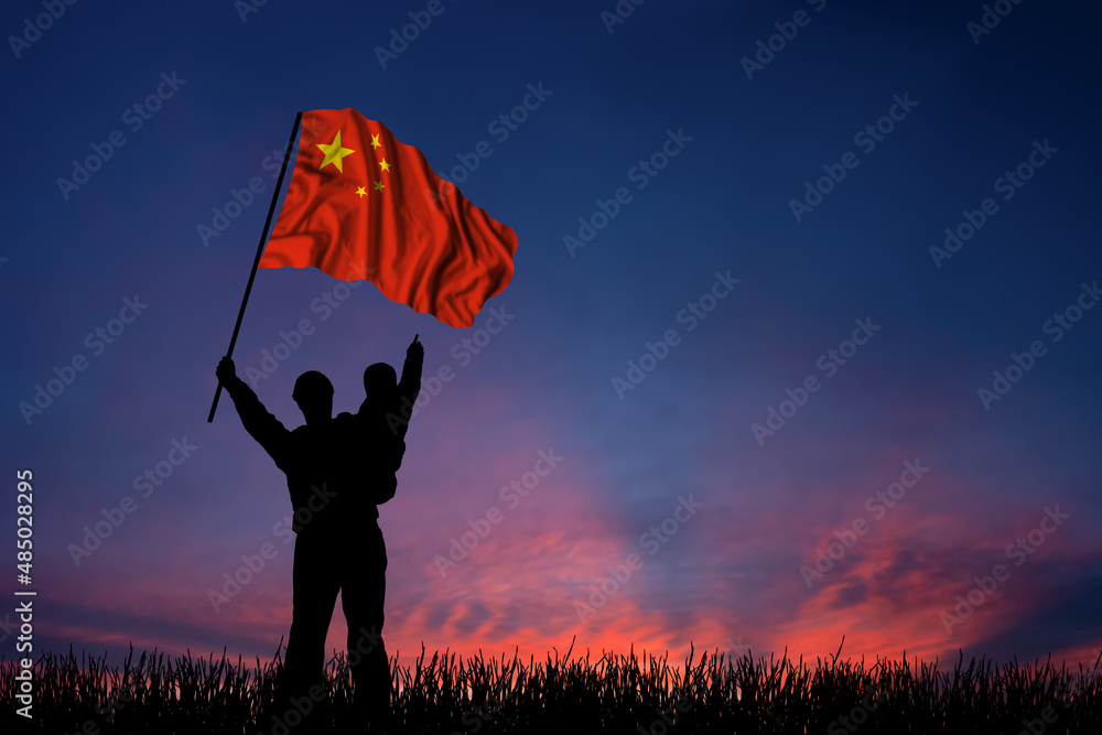 Father and son hold the flag of Republic of China