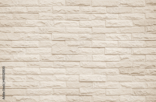 Cream and white brick wall texture background. 