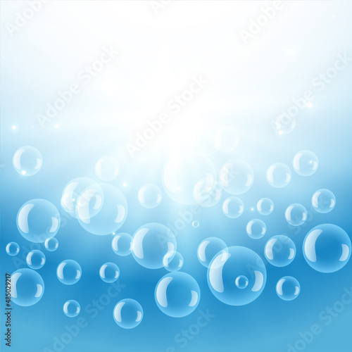 shiny water bubbles with light flare background