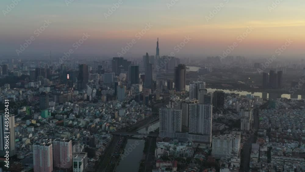 Ho Chi Minh City, Vietnam Feb 2022 4k aerial video of Downtown city skyline during Tet holiday at Sunrise Ho Chi Minh City, Vietnam Feb 2022 4k aerial video of Downtown city skyline during Tet holiday at Sunrise