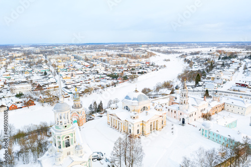 Aerial drone view of Novotorzhsky Borisoglebsky Monastery with Tvertsa river in Torzhok, Russia. Russian winter landscape