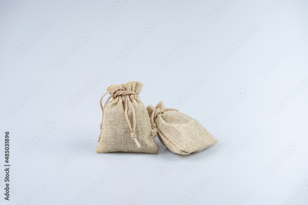 Full fill sack bags on the ground.