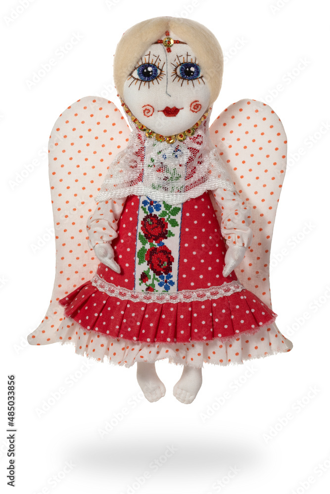 Handmade personal doll amulet on white background. Full depth of field. With clipping path Handmade personal doll amulet on white background. Full depth of field. With clipping path