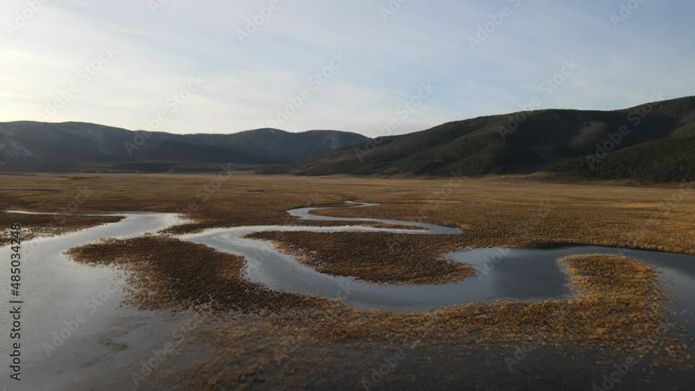 the picturesque mouth of the Goloustnaya river at different times of the year on the shores of Lake Baikal the picturesque mouth of the Goloustnaya river at different times of the year on the shores of Lake Baikal
