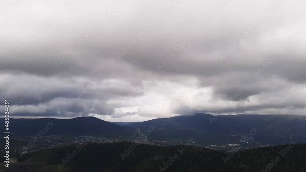 clouds over the city in the mountains clouds over the city in the mountains
