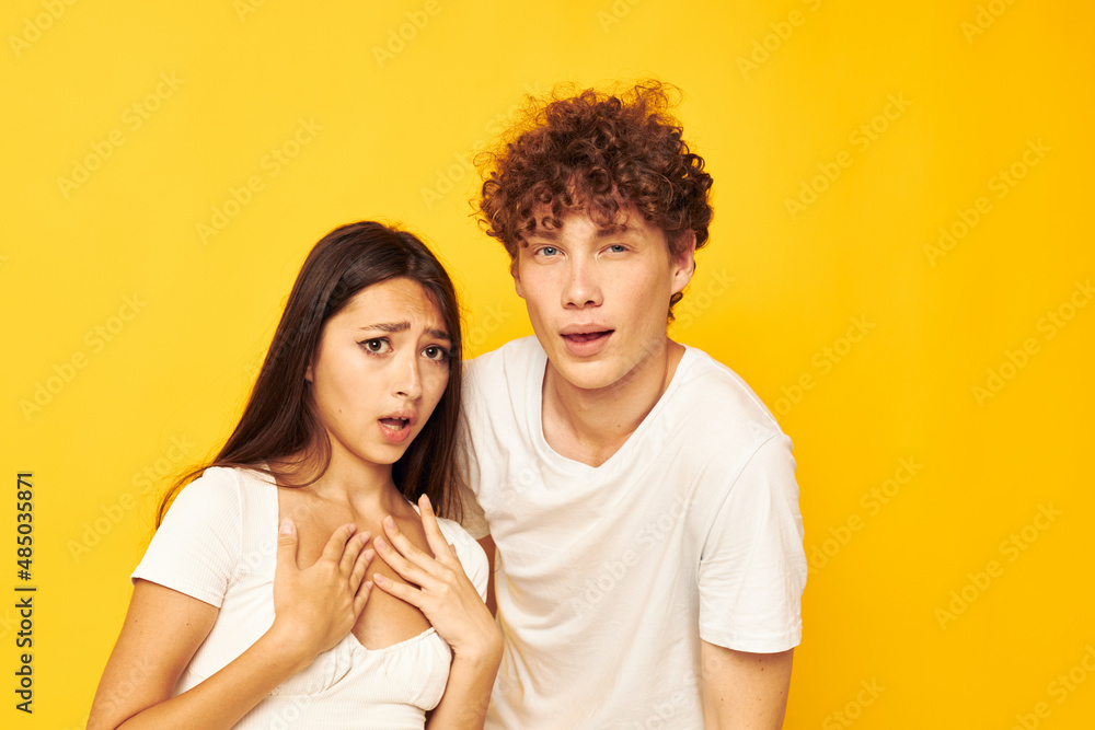 teenagers standing side by side in white t-shirts posing Lifestyle unaltered teenagers standing side by side in white t-shirts posing Lifestyle unaltered
