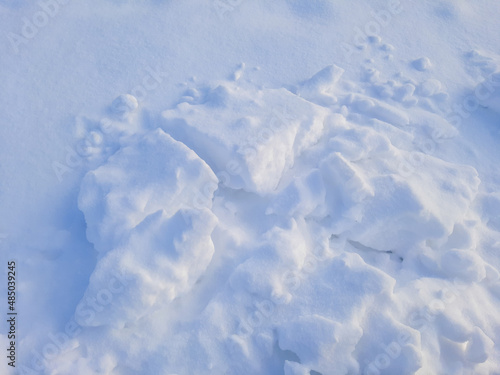 Pieces of snow of various shapes