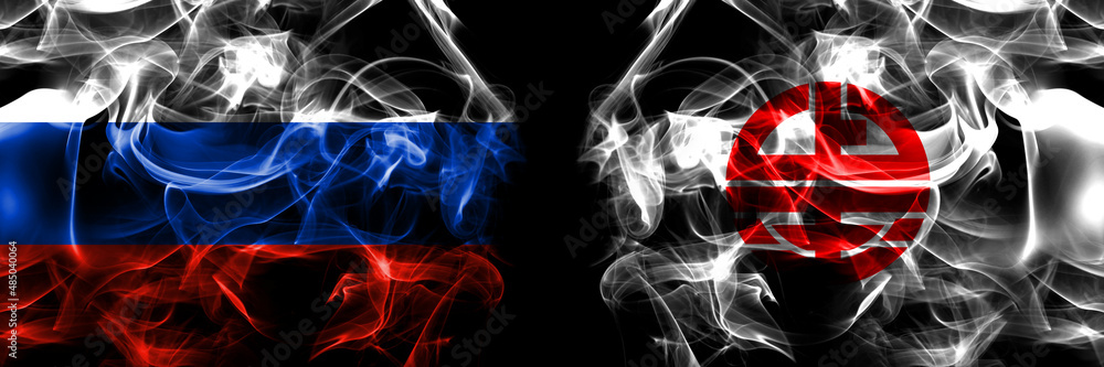 Russia, Russian vs Japan, Japanese, Kaminokuni, Hokkaido, Hiyama, Subprefecture flags. Smoke flag placed side by side isolated on black background