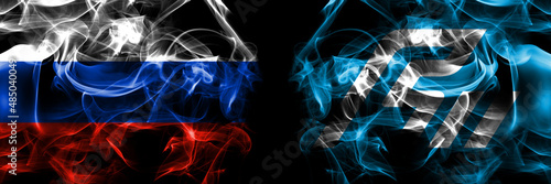 Russia, Russian vs Japan, Japanese, Ishikawa Prefecture flags. Smoke flag placed side by side isolated on black background