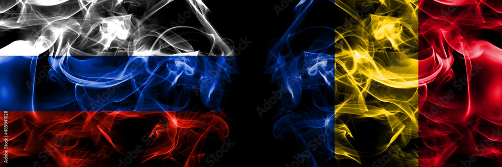 Russia, Russian vs Romania, Romanian flags. Smoke flag placed side by side isolated on black background