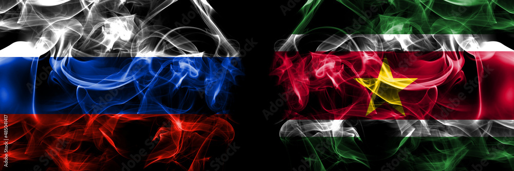 Russia, Russian vs Suriname flags. Smoke flag placed side by side isolated on black background