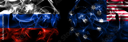 Russia, Russian vs United States of America, America, US, USA, American, Easton, Pennsylvania flags. Smoke flag placed side by side isolated on black background photo