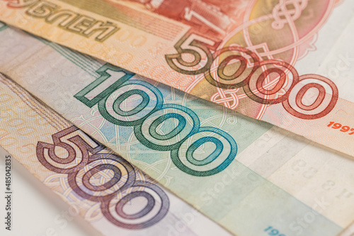 Close-up of banknotes. Five thousand, one thousand, five hundred rubles.