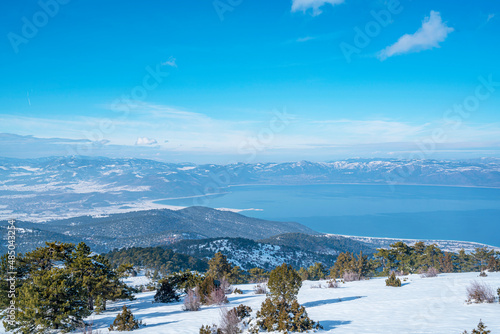 Scenic views from Salda lake with snow at the Salda ski center which is famous with lake which has white sand, glassy turquoise water.