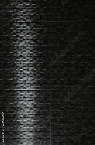dark background, light​ on​ dark​ virtical​ title​ pattern​