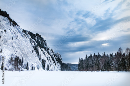 Winter landscape, rocks and forest, Siberia, Mana river. Hike