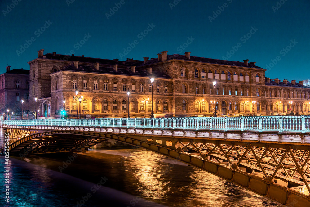 Twilight scene from Paris Seine River with fantastic colors during sunset.