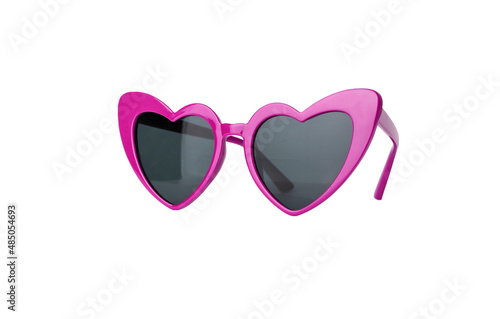 Bright pink heart-formed sunglasses isolated on white background. Valentines day or summer vacation concept. High quality photo