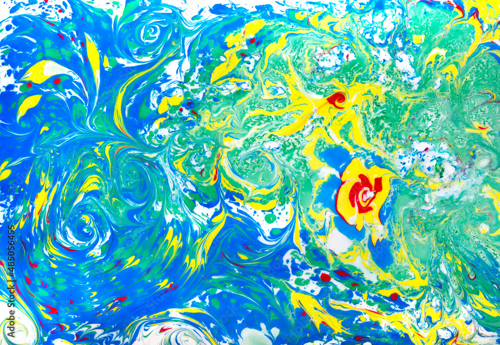 Drawing in the ebru technique without a sketch, painting on water, abstract drawing, beautiful pattern..Abstract marbling colorful background. Drawing in the ebru technique without a sketch, painting on water, abstract drawing, beautiful pattern..Abstract marbling colorful background.