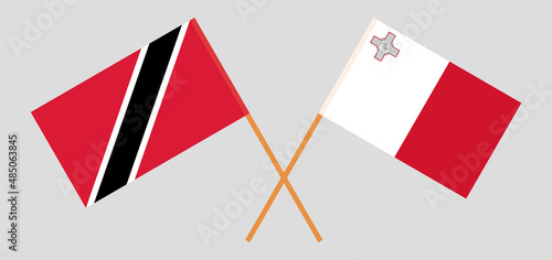 Crossed flags of Malta and Trinidad and Tobago. Official colors. Correct proportion