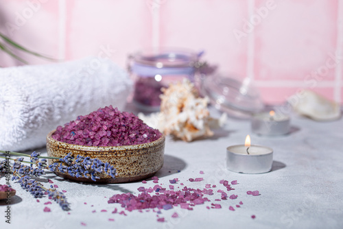 Purple bath salt with lavender  towel and candles