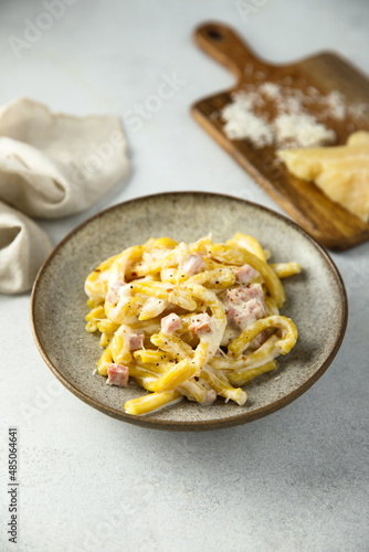 Traditional homemade pasta Carbonara with cheese and ham