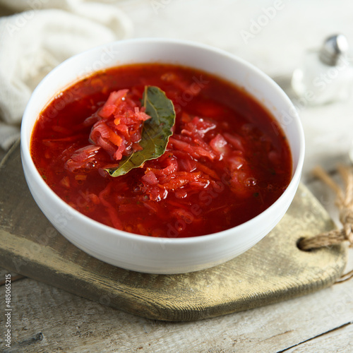 Traditional homemade beetroot soup with bay leaf