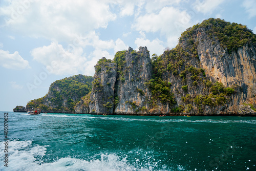 Vacation on island. Beautiful landscape with sea, boat and rocks.