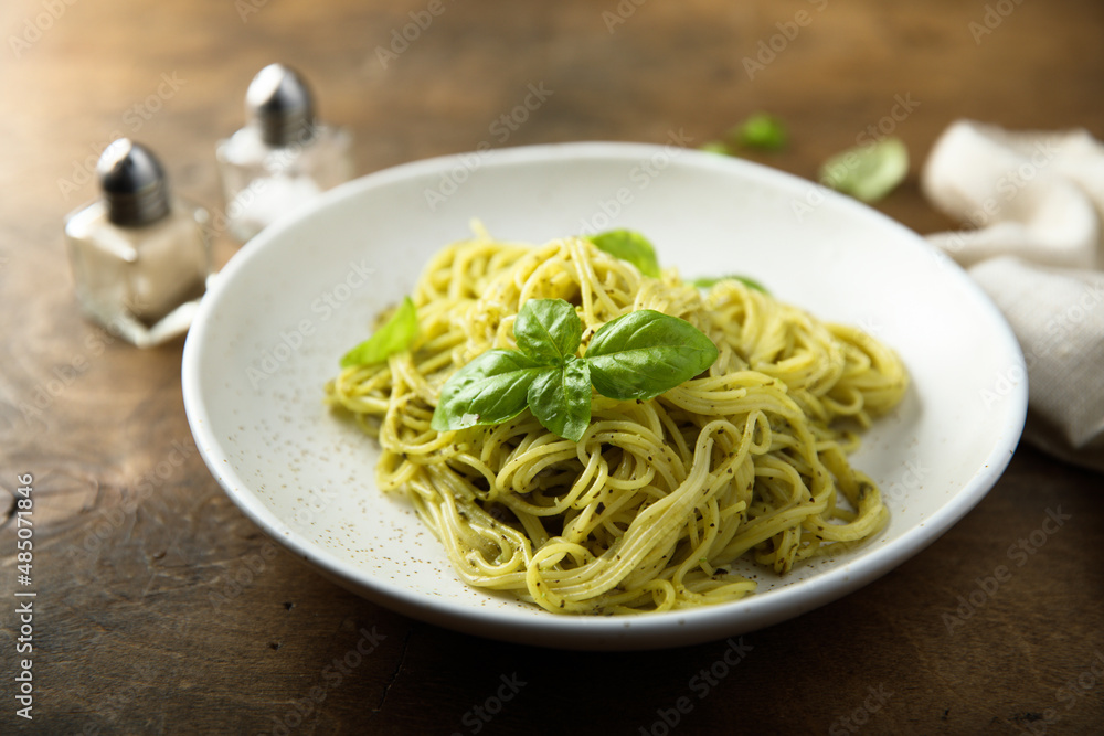 Traditional spaghetti with pesto sauce