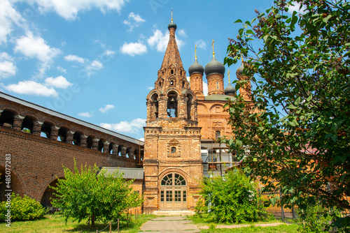 Red brick Dormition Cathedral in the Krutitsy Patriarchal Metochion ecclesiastical estate built in 1600’s in Tagansky District of Moscow, Russia

 photo