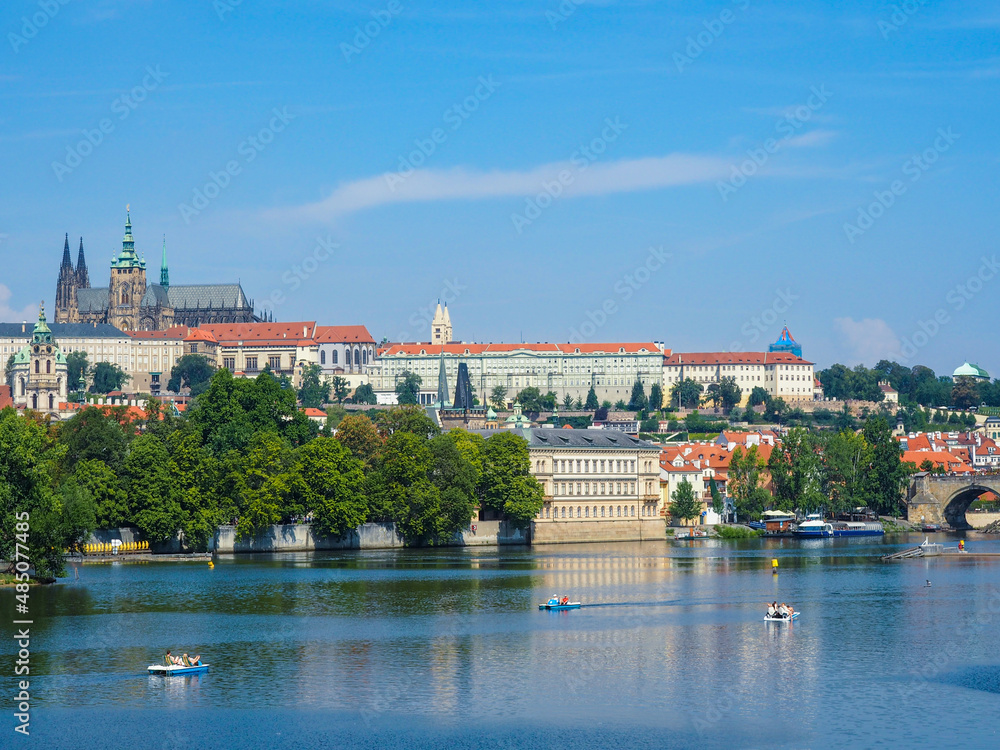 Fototapeta premium The Vitava and the St. Vitus Cathedral in Prague, Czech republic