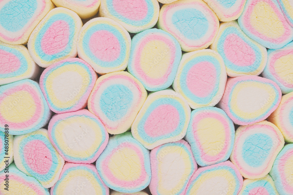 slices of multicolored fruit marshmallows, sweet pattern slices of multicolored fruit marshmallows, sweet pattern