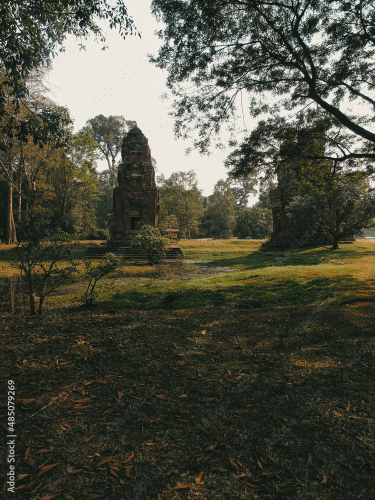 Ruins of an ancient stone temple lost in the Cambodian jungle - Prasat Suor Prat of Angkor temples