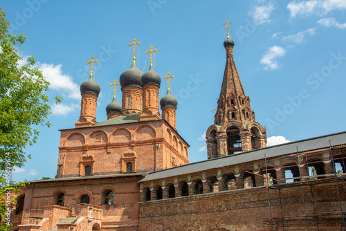 Red brick Dormition Cathedral in the Krutitsy Patriarchal Metochion ecclesiastical estate built in 1600’s in Tagansky District of Moscow, Russia

 photo