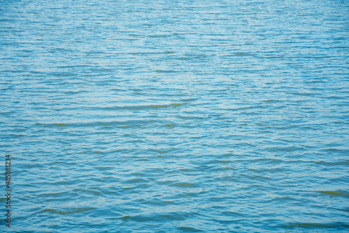 The surface of the water is blue in the evening.