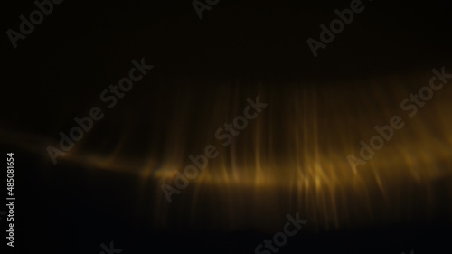 Golden bokeh crystal abstract light rays background, shiny flare texture photo overlay optical lens prism reflection. Use screen overlay mode.