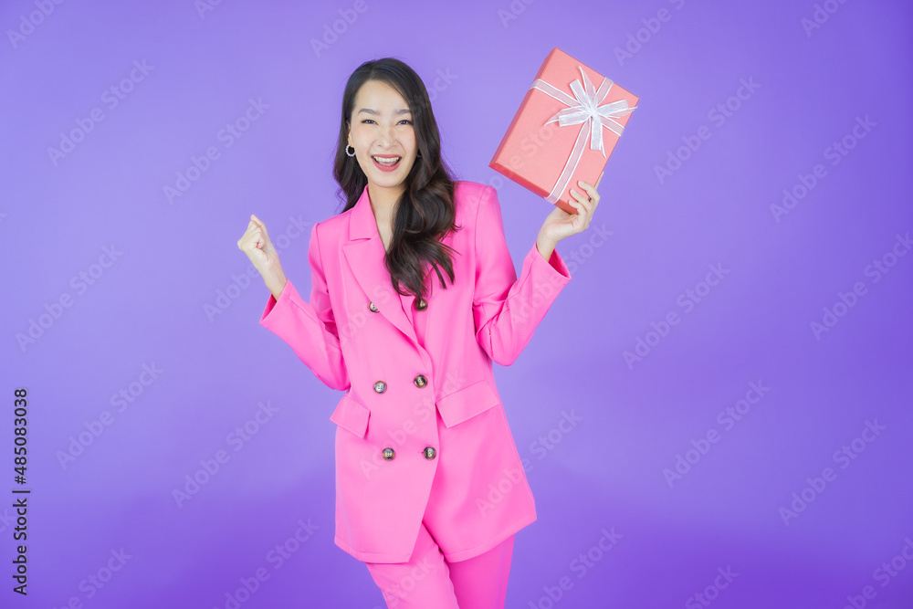 Portrait beautiful young asian woman smile with red gift box Portrait beautiful young asian woman smile with red gift box