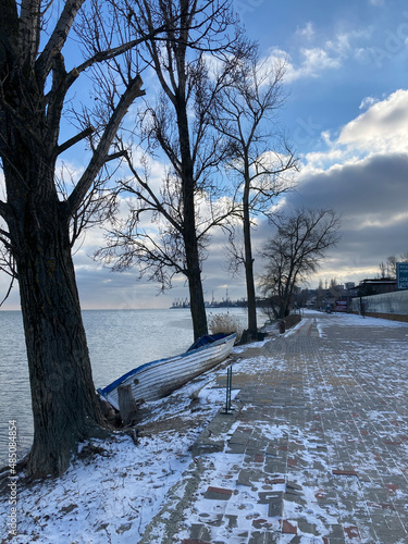 
Winter landscape with a boat