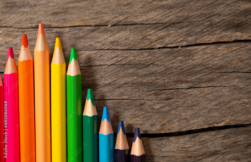 pencils on wooden background. Back to school. pencils on wooden background. Back to school.