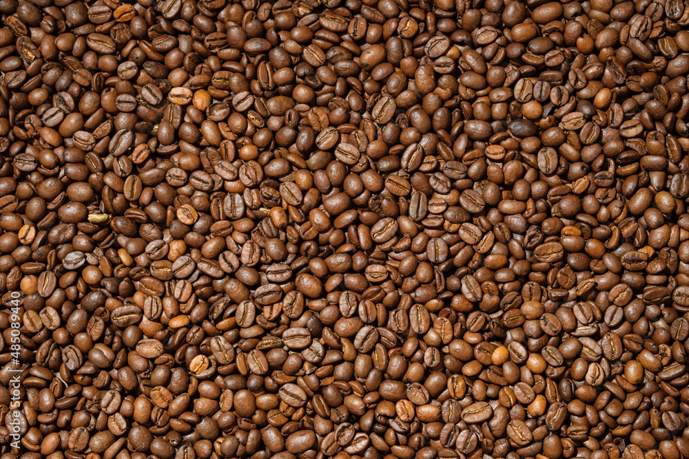 Background from fresh roasted aromatic coffee beans. Background from fresh roasted aromatic coffee beans.