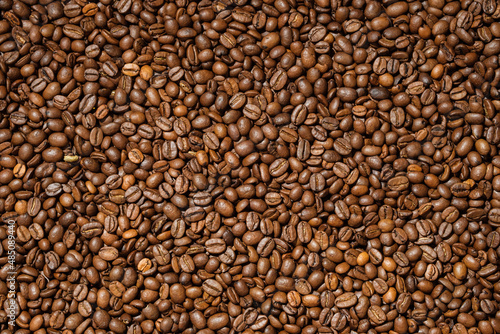 Background from fresh roasted aromatic coffee beans. © Valerii